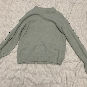 Target turtle neck sweater with buttons on the arm